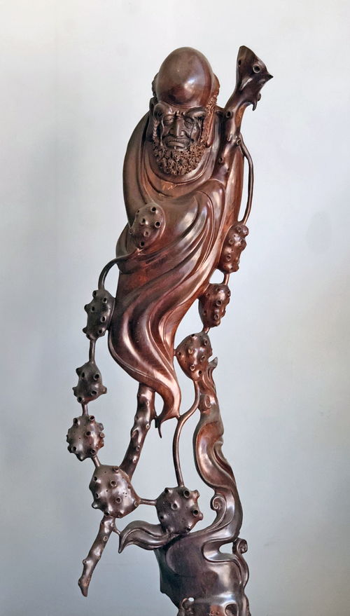 莆田工艺美术师陈喜伟花卉木雕与根雕作品赏析